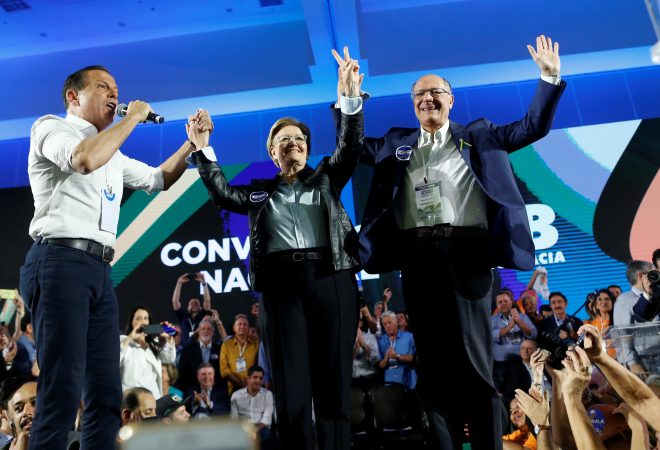 Geraldo Alckmin, a candidate for the presidency of the Republic of Brazil, celebrates next to his vice-presidency candidate Senator Ana Amelia during the National Convention of the Brazilian Social Democracy Party (PSDB) in Brasilia, Brazil August 4, 2018. REUTERS/Adriano Machado