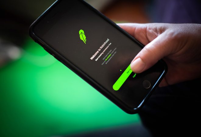 The Robinhood application on a smartphone arranged in Hastings-On-Hudson, New York, U.S., on Friday, Jan. 29, 2021. GameStop Corp. advanced on Friday and was on track to recoup much of Thursdays $11 billion blow after Robinhood Markets Inc. and other brokerages eased trading restrictions on the video-game retailer. Photographer: Tiffany Hagler-Geard/Bloomberg via Getty Images