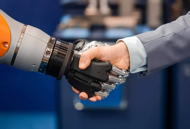 66-homem-e-mao-robotica-em-aperto-de-mao.jpg