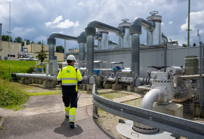 99513556-an-employee-of-uniper-energy-storage-walks-through-the-above-ground-facilities-of-a-nat
