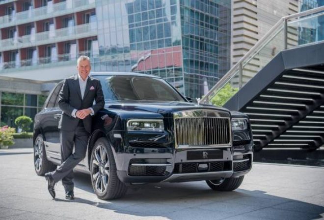 P90379893-torsten-muller-otvos-chief-executive-officer-rolls-royce-motor-cars-with-rolls-royce-cullinan-600px