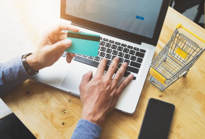 Shopping online use credit card to pay online.Vintage tone, Retro filter effect. Business online shopping and sale concept .
