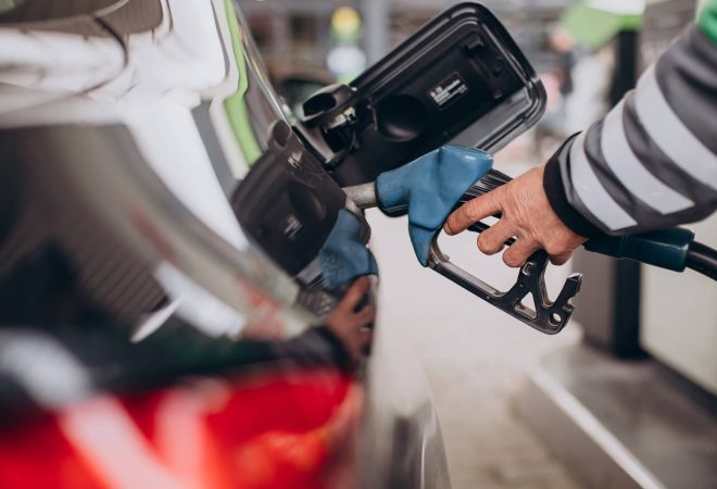 Car refueling at fuel station