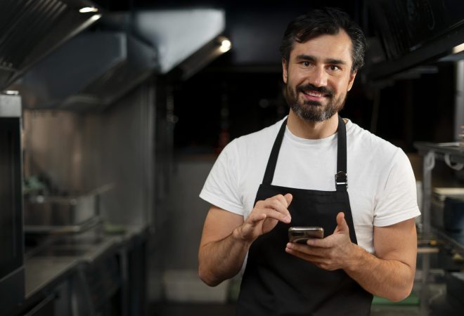 chef-cooking-kitchen-while-wearing-professional-attire