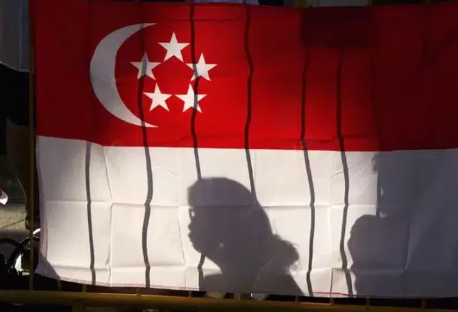 Bandeira de Singapura: país teve boom ao atrair sedes de multinacionais (Ed Wray/Getty Images)Este é um trecho original publicado em Exame.com. Leia a matéria completa em https://exame.com/mundo/como-singapura-ficou-tao-rica/?utm_source=copiaecola&utm_medium=compartilhamento