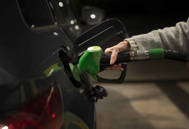 close-up-hand-holding-gas-pump