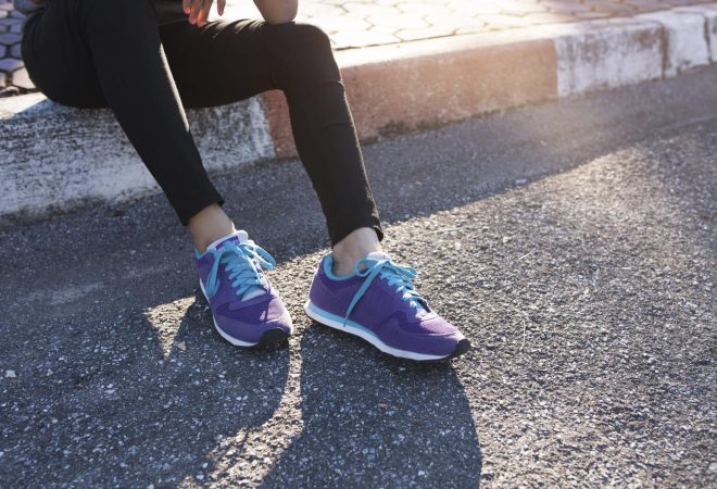 close-up-sporty-woman-with-purple-sneakers