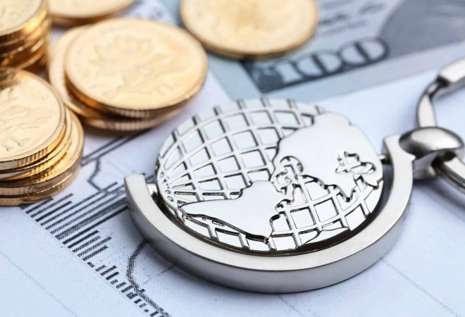 Coins, paper money and globe on white Statistic form background