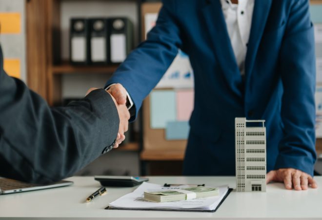 Customers who choose to buy a condominium room and a bank approve a loan for their purchase. Condominium and house loan interest rate from bank concept in office
