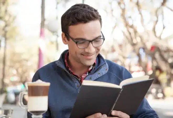 depositphotos_92309496-stock-photo-man-reading-a-book