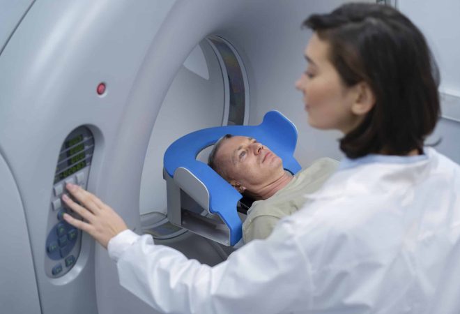doctor-getting-patient-ready-ct-scan