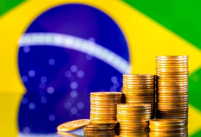 A,Stack,Of,Gold,Coins,On,The,Background,Of,The