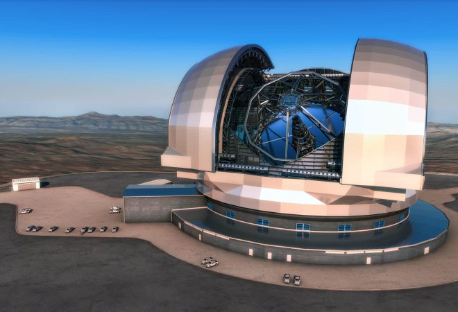 This artist’s impression shows the European Extremely Large Telescope (E-ELT) in its enclosure. The E-ELT will be a 39-metre aperture optical and infrared telescope sited on Cerro Armazones in the Chilean Atacama Desert, 20 kilometres from ESO’s Very Large Telescope on Cerro Paranal, which is visible in the distance towards the left. The design for the E-ELT shown here is preliminary.