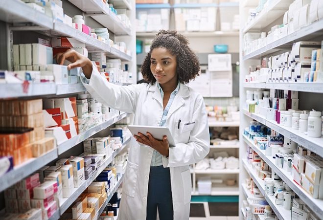 Never fear, your pharmacist is here. Cropped shot of an attractive young female pharmacist working in a pharmacy.