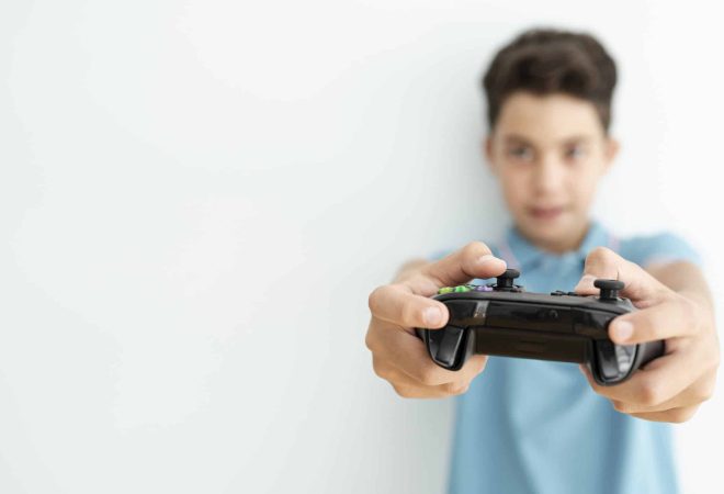 freepik-blurred-kid-holding-controller