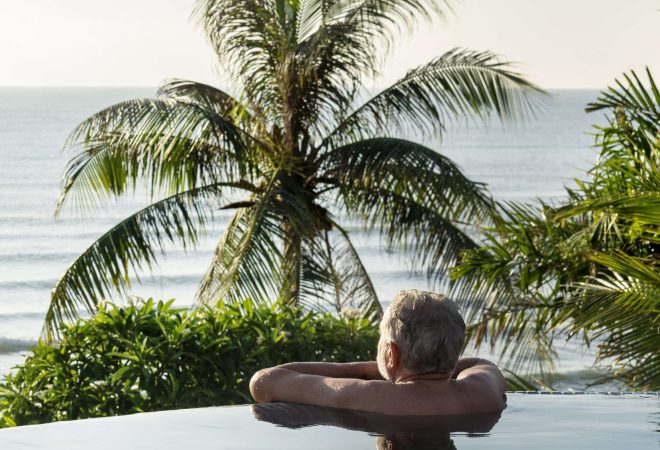 Senior man chilling in swimming pool
