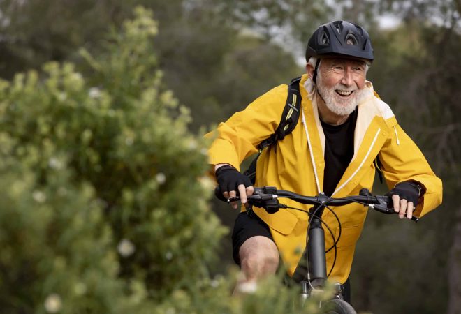 freepik_senior-man-with-bike