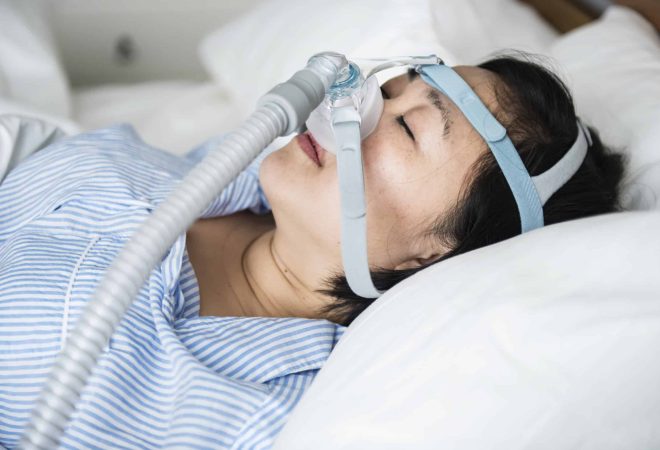 freepik_woman-wearing-anti-snoring-chin-straps