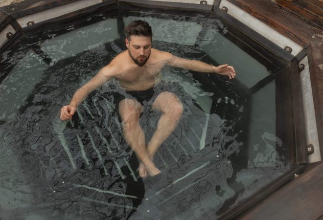 full-shot-man-experiencing-cold-exposure-wellness
