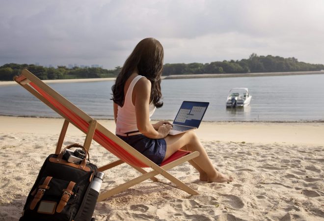 full-shot-woman-working-laptop