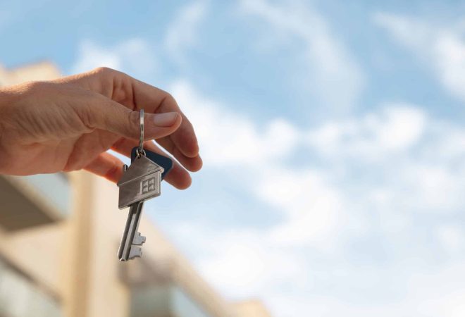 hand-holding-key-with-copy-space