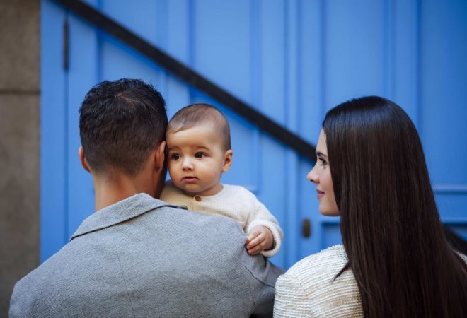 A Caucasian happy family with an infant girl