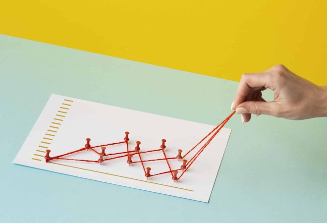 high-angle-chart-statistics-presentation-with-hand