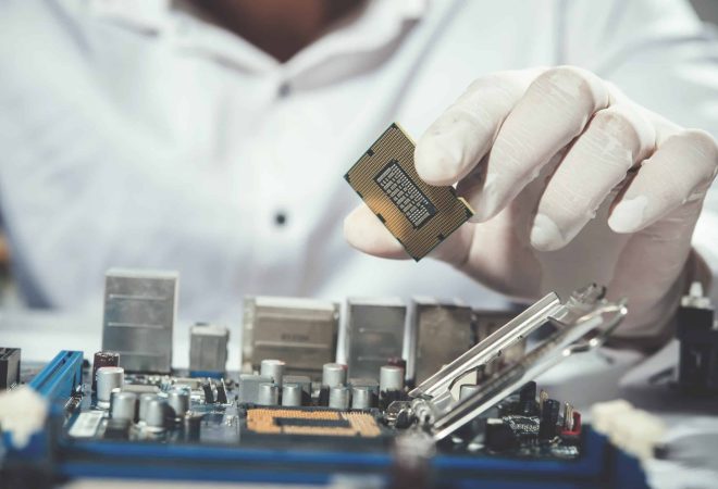 The technician repairing the computer,computer hardware, repairing, upgrade and technology