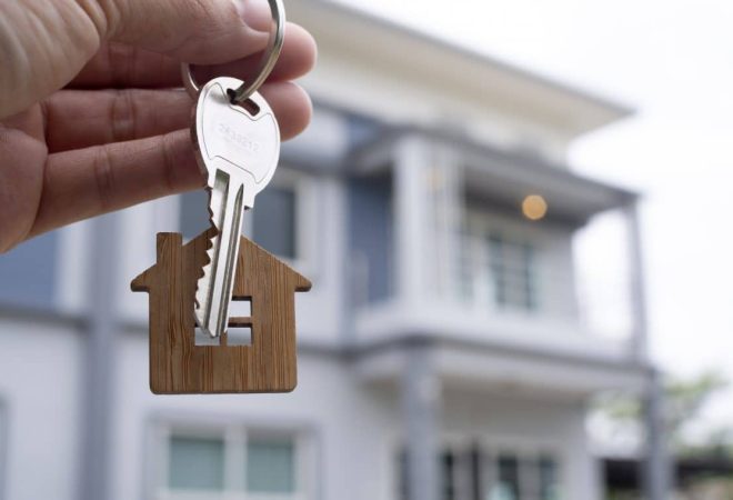 landlord-unlocks-house-key-new-home-real-estate-agents-sales-agents-1140x760