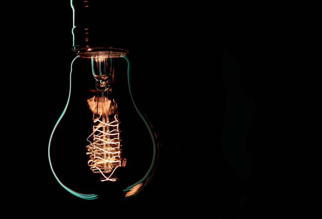 Luminous lamp hang in the dark. Decor and atmosphere concept.