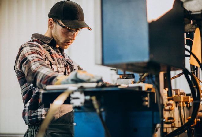 Man working on steel fatory and equipment for steel production