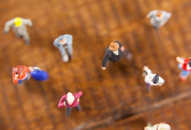 Conceptual image of miniature people travelling
