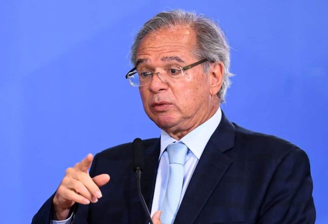 Brazilian Minister of Economy Paulo Guedes delivers a speech during an event to present the new national ID and passport at Planalto Palace in Brasilia on June 27, 2022. (Photo by EVARISTO SA / AFP)