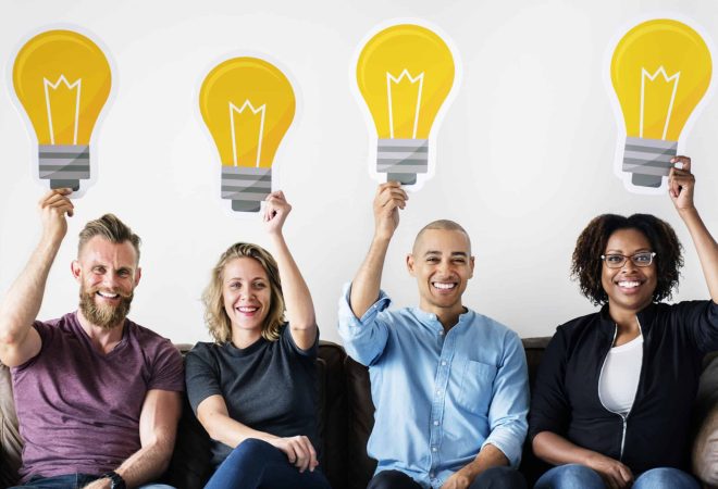 People carrying light bulb icons
