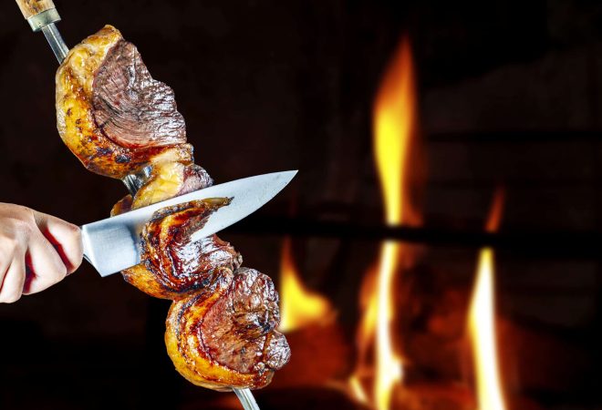 Steak rotisserie at the steakhouse, sliced picanha