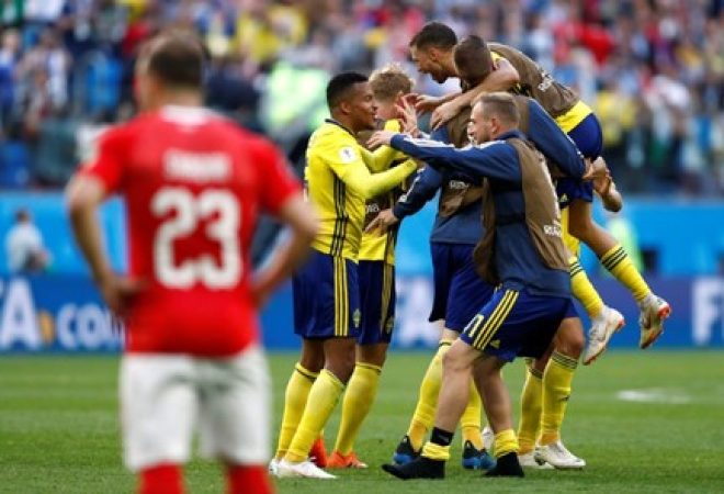 Jogadores da Suécia comemoram classificação