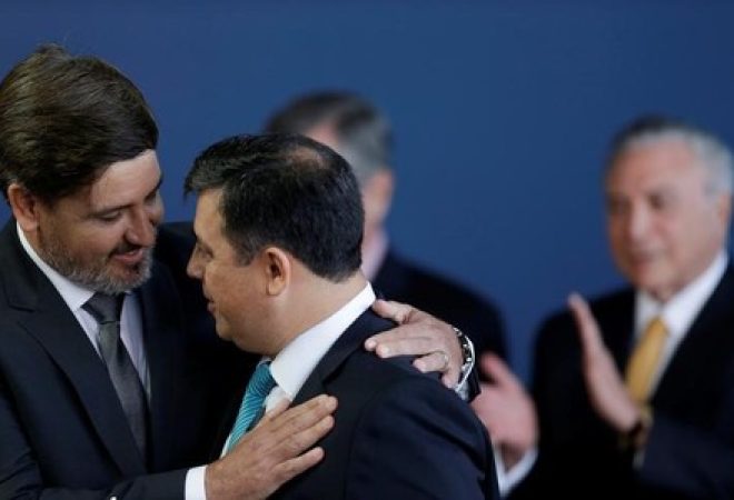 New Director of Brazilian Federal Police, Delegate Fernando Queiroz Segovia Oliveira greets former Director of Brazilian Federal Police Leandro Daiello during the handover ceremony for the new General Director of the Federal Police in Brasilia