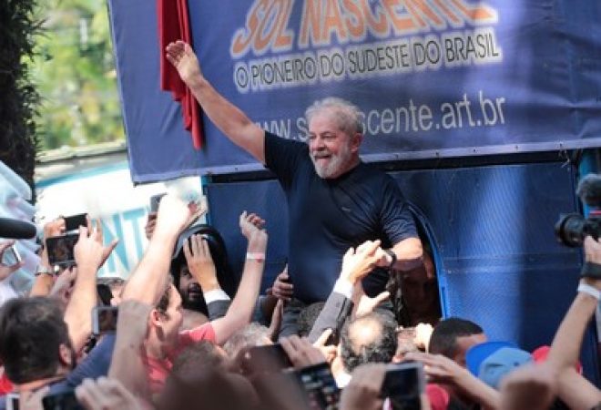 Former Brazilian President Luiz Inacio Lula da Silva is carried by supporters in front of the metallurgic trade union in Sao Bernardo do Campo