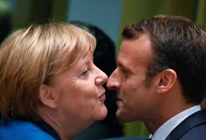 Merkel e Macron durante cúpula da UE em Bruxelas