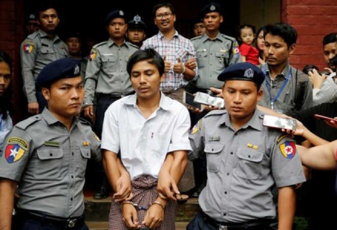 Jornalistas da Reuters presos em Mianmar Kyaw Soe Oo e Wa Lone
