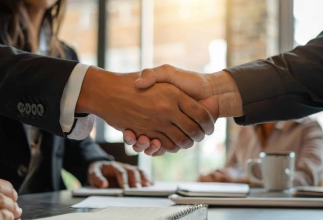two-confident-business-man-shaking-hands-meeting-office-success-dealing-greeting