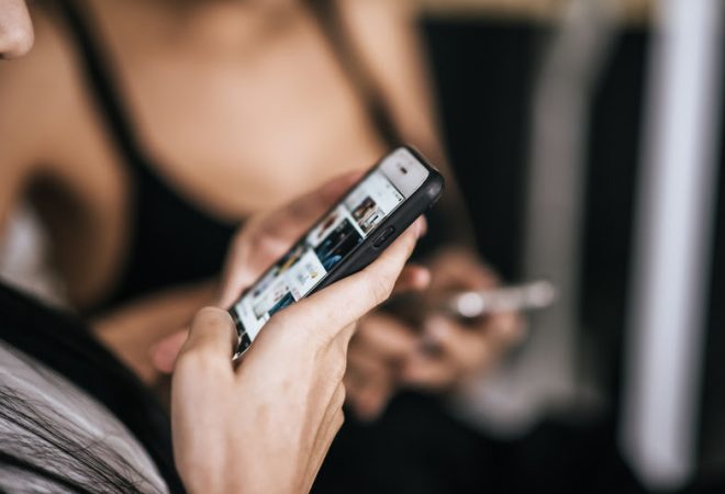 Women Touch And Chatting with smartphone