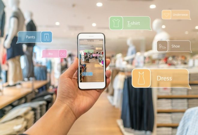 Augmented reality marketing. Hand holding smart phone use AR application to check information