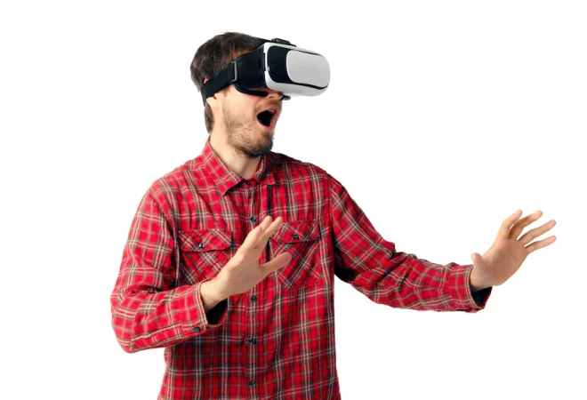 young-caucasian-man-emotional-playing-using-virtual-reality-headset-isolated-white-studio-wall-concept-modern-technologies-gadgets-tech-human-emotions-advertising-copyspace-ar-vr_155003-38911